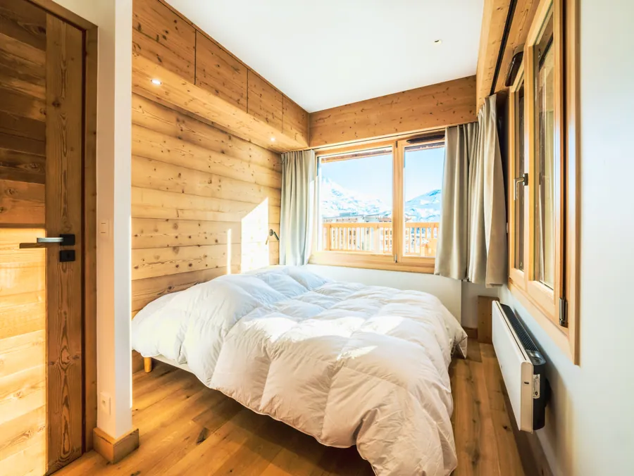 Chambre et rangements dans la continuité du séjour